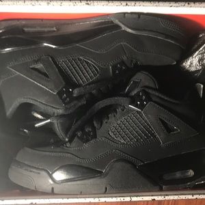 Black Cat Jordan 4’s